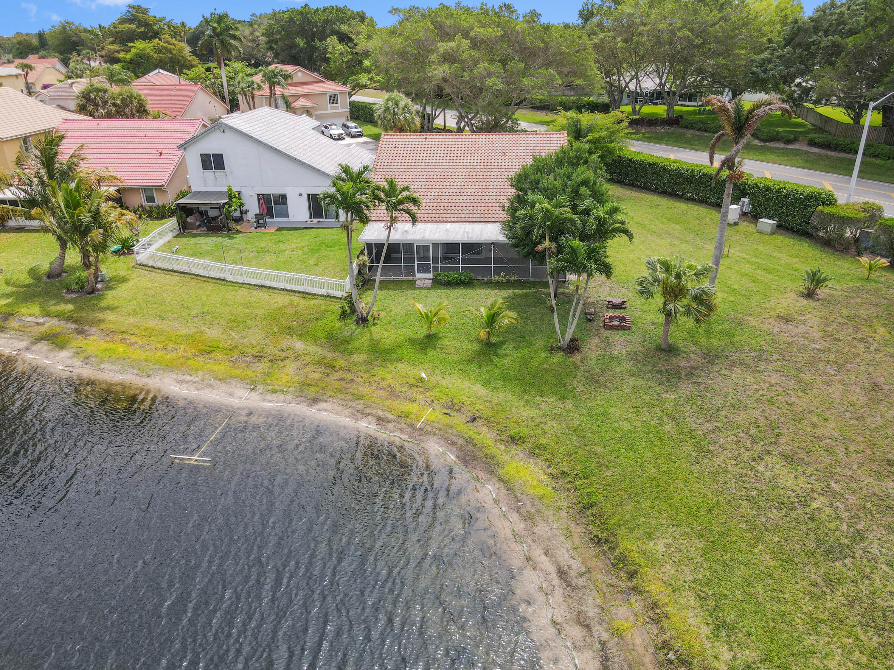 7433 Shell Ridge Terrace Lake Worth, FL 33467 - Photo 39 of 45 an aerial view of a house with a yard