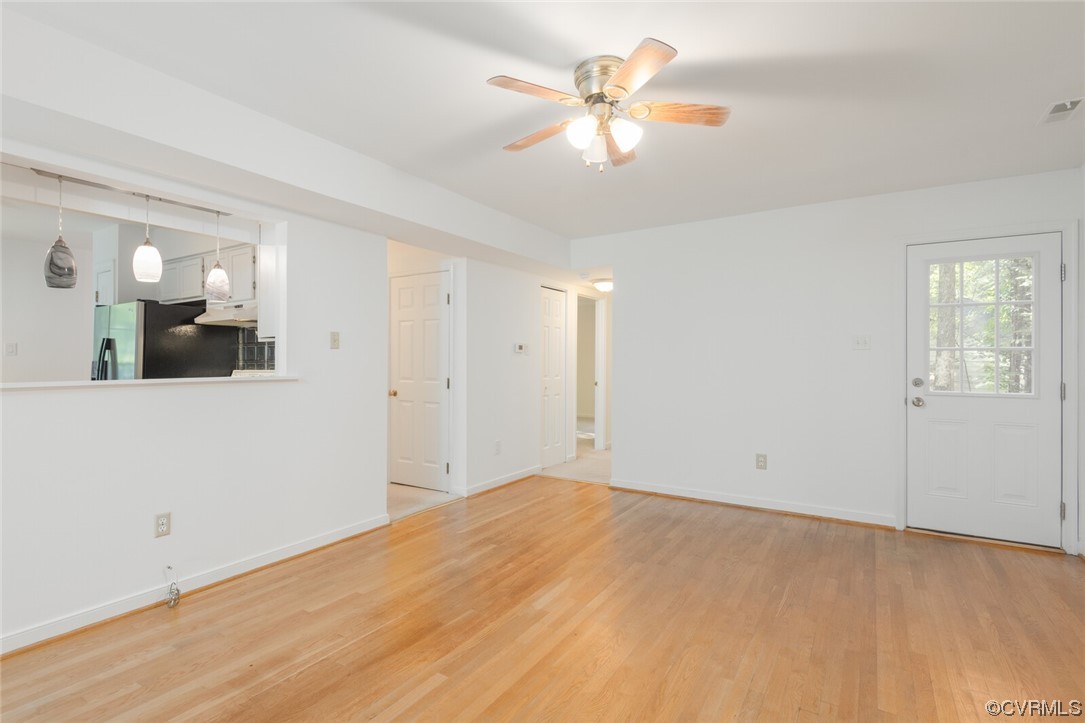 5820 Mill Spring Road Midlothian, VA 23112 - Photo 18 of 35 wooden floor in an empty room with a window