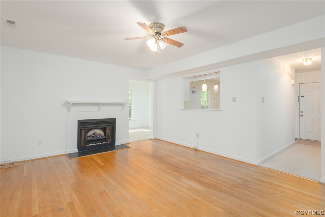 5820 Mill Spring Road Midlothian, VA 23112 - Photo 19 of 35 an empty room with fan and fireplace