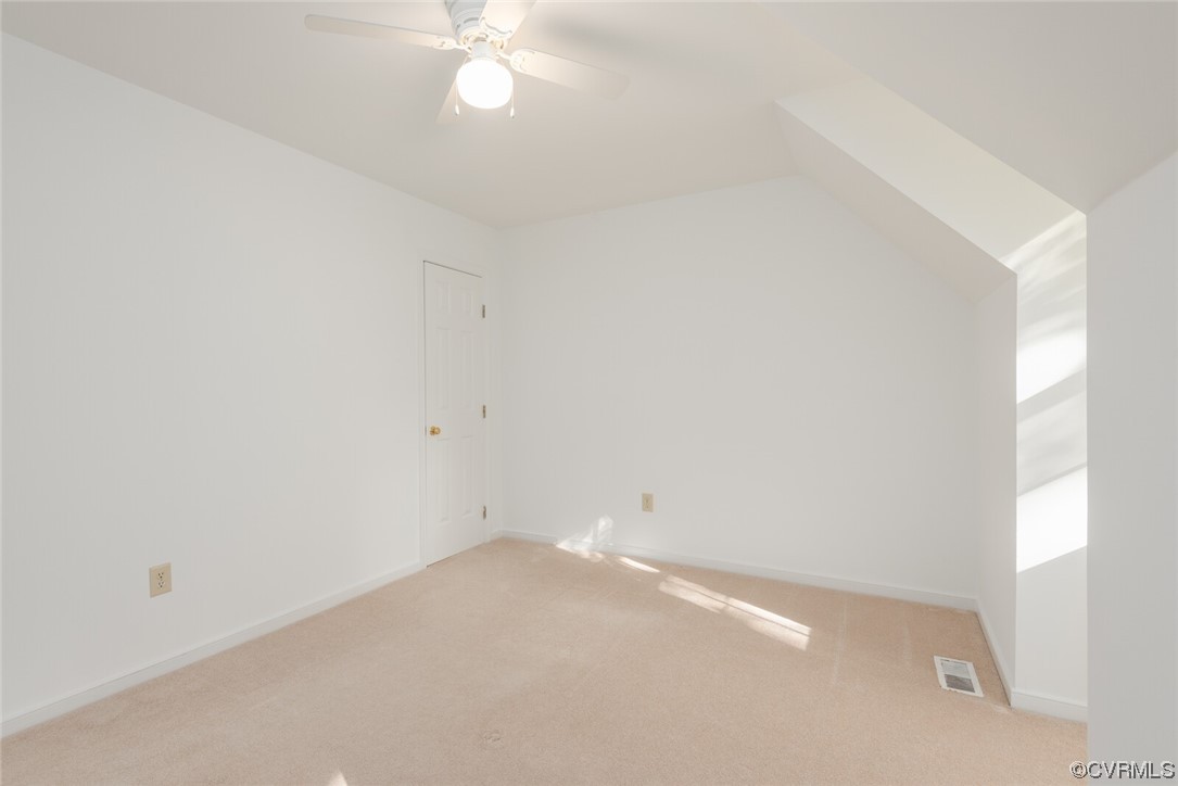 5820 Mill Spring Road Midlothian, VA 23112 - Photo 29 of 35 an empty room with a chandelier fan