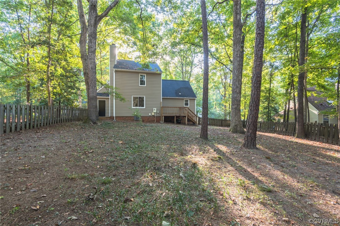 5820 Mill Spring Road Midlothian, VA 23112 - Photo 6 of 35 a house view with a backyard space