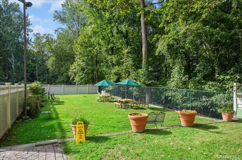 a garden view with a seating space