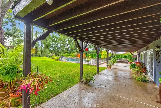 a view of a porch with garden