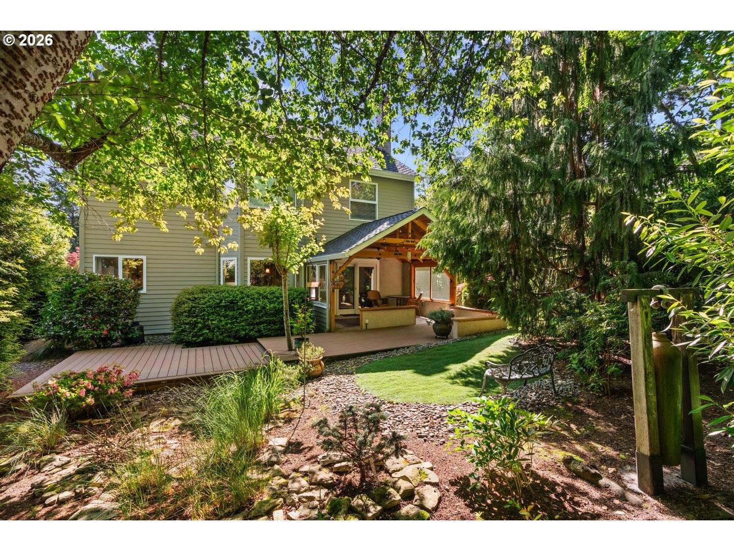 16042 Southwest Waxwing Way Beaverton, OR 97007 - Photo 46 of 48 a front view of a house with garden