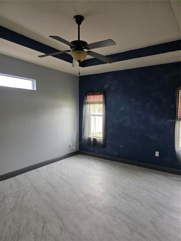 2850 Sheldon Street Lakeland, FL 33813 - Photo 18 of 59 a view of an empty room with a window
