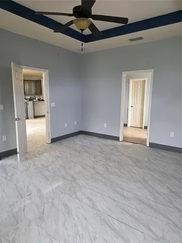 a view of an empty room with a sink