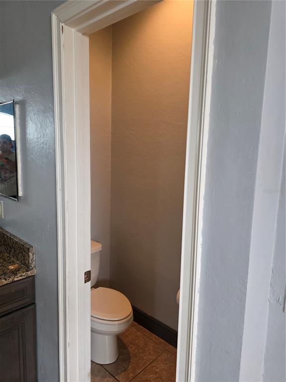 2850 Sheldon Street Lakeland, FL 33813 - Photo 26 of 59 a white toilet sitting next to a shower