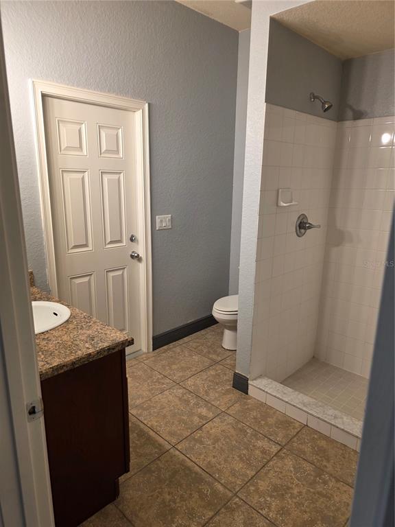2850 Sheldon Street Lakeland, FL 33813 - Photo 29 of 59 a bathroom with a granite countertop sink and a mirror