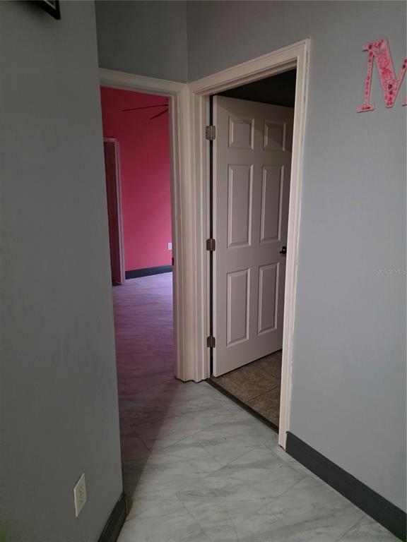 2850 Sheldon Street Lakeland, FL 33813 - Photo 38 of 59 an empty room with wooden floor and closet