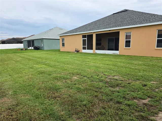 a front view of house with yard and porch