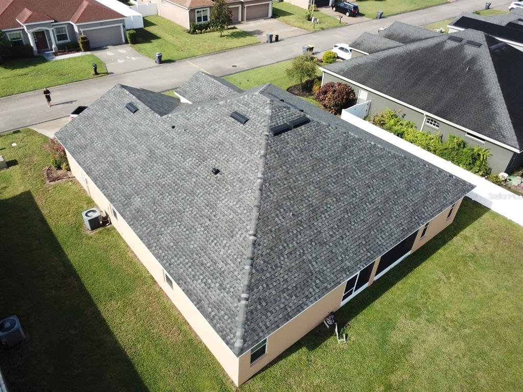 2850 Sheldon Street Lakeland, FL 33813 - Photo 56 of 59 a view of a swimming pool with a yard