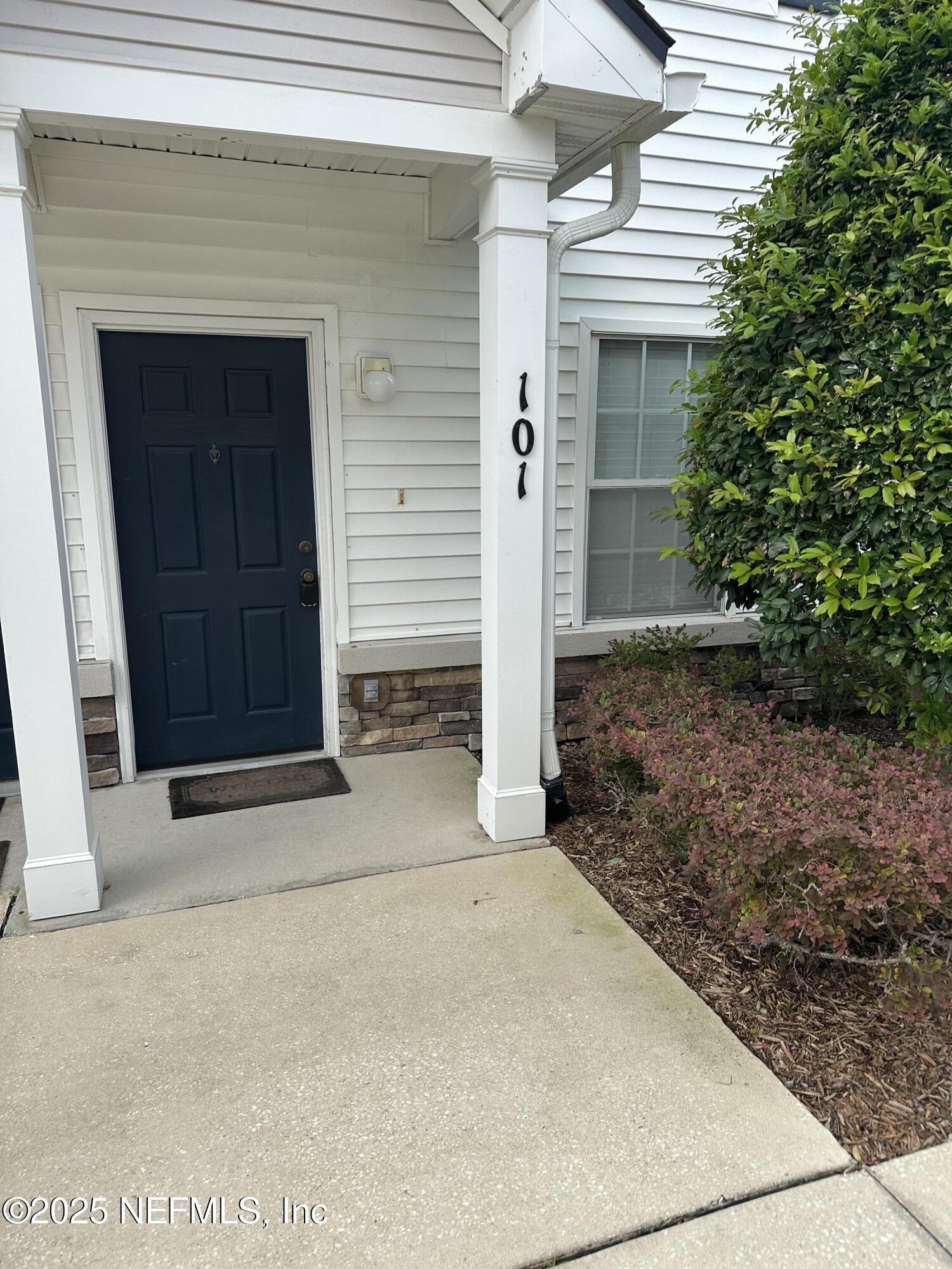 2200 Marsh Hawk Lane, Unit 101 Fleming Island, FL 32003 - Photo 18 of 18 a front view of a house