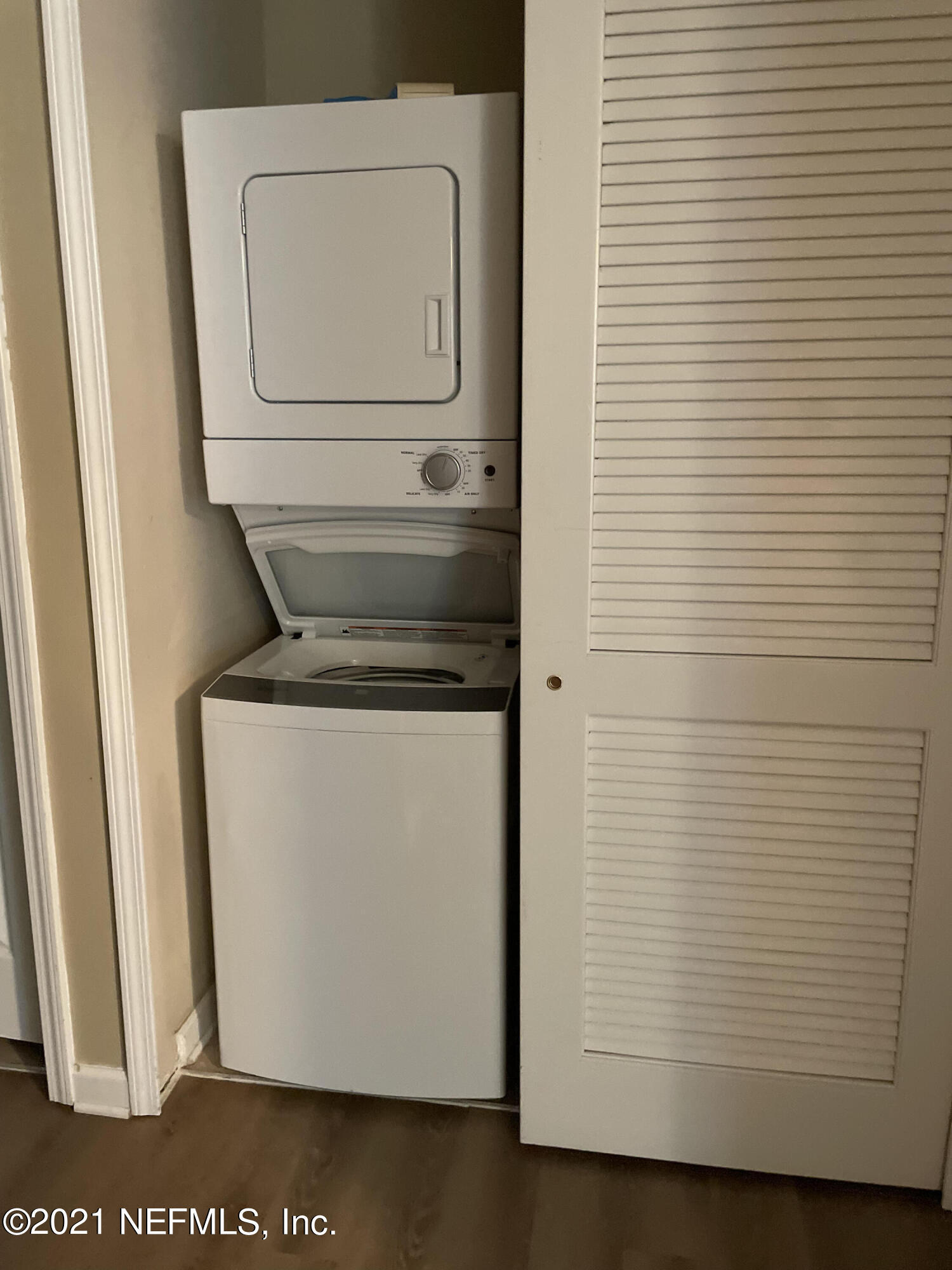 2200 Marsh Hawk Lane, Unit 101 Fleming Island, FL 32003 - Photo 2 of 18 a view of washer and dryer