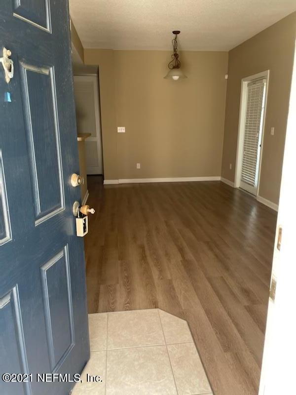 2200 Marsh Hawk Lane, Unit 101 Fleming Island, FL 32003 - Photo 5 of 18 a view of livingroom with furniture