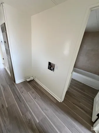 a bathroom with a sink a mirror and shower