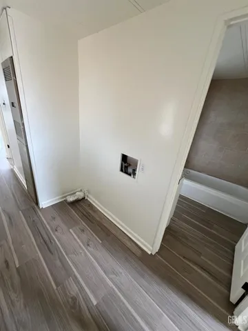 a bathroom with a sink a mirror and shower