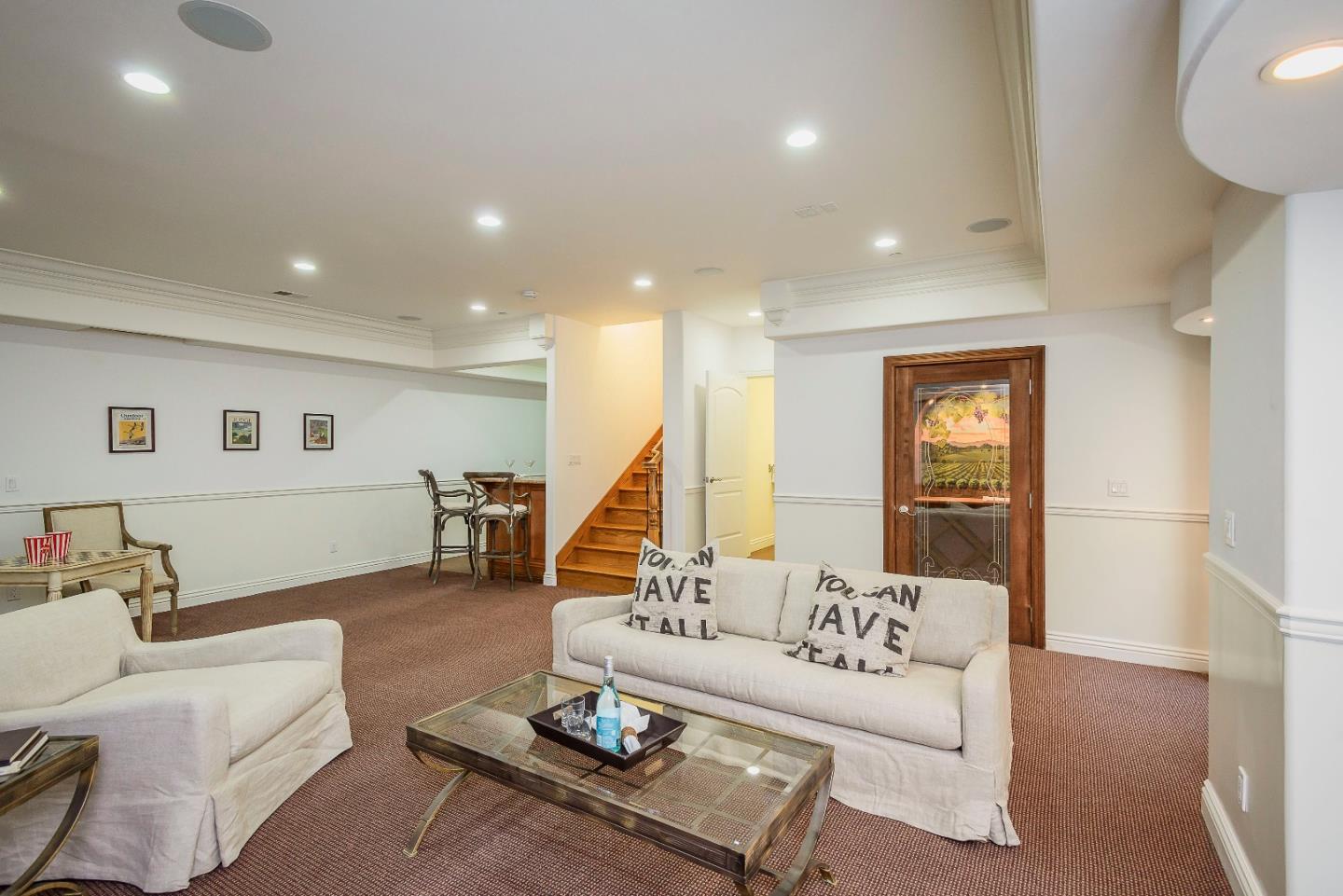 836 Newhall Road Burlingame, CA 94010 - Photo 17 of 38 a living room with furniture and wooden floor