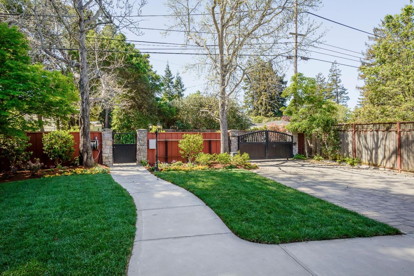 836 Newhall Road Burlingame, CA 94010 - Photo 3 of 38 a front view of a house with garden
