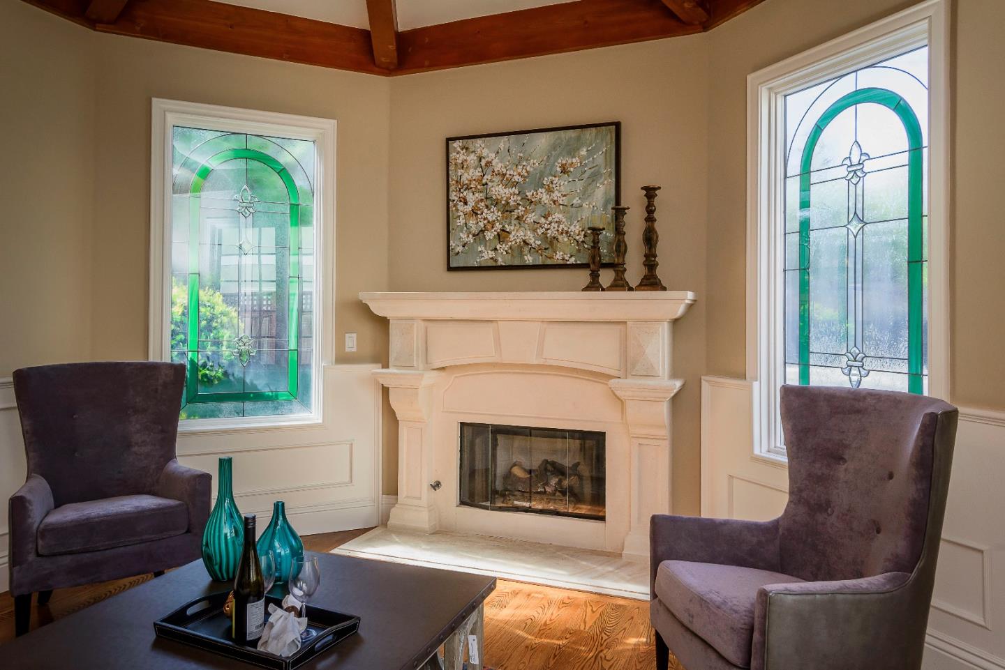 836 Newhall Road Burlingame, CA 94010 - Photo 4 of 38 a living room with furniture fireplace and a large window