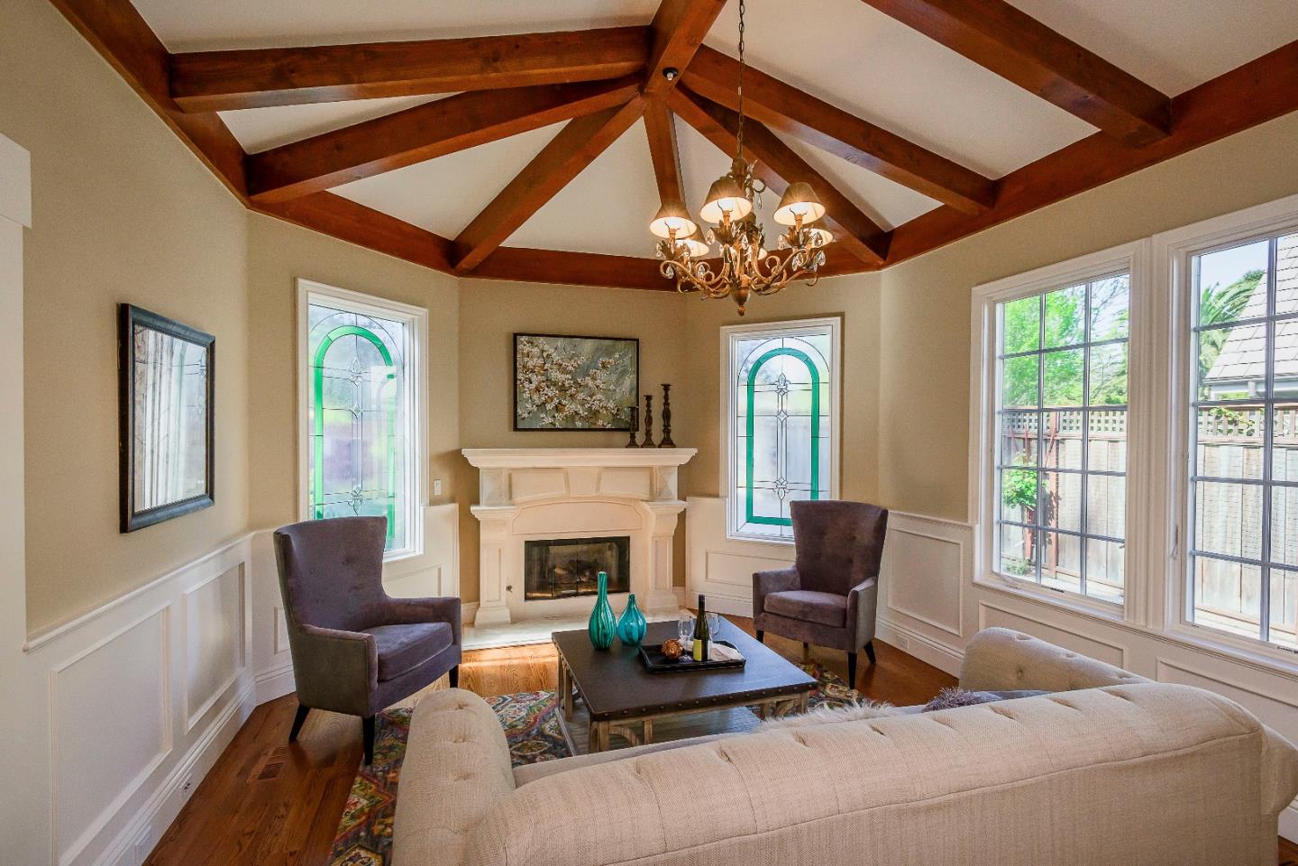 836 Newhall Road Burlingame, CA 94010 - Photo 5 of 38 a living room with furniture and a fireplace