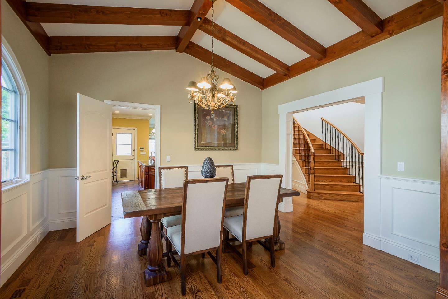 836 Newhall Road Burlingame, CA 94010 - Photo 7 of 38 a view of a dining room with furniture and wooden floor