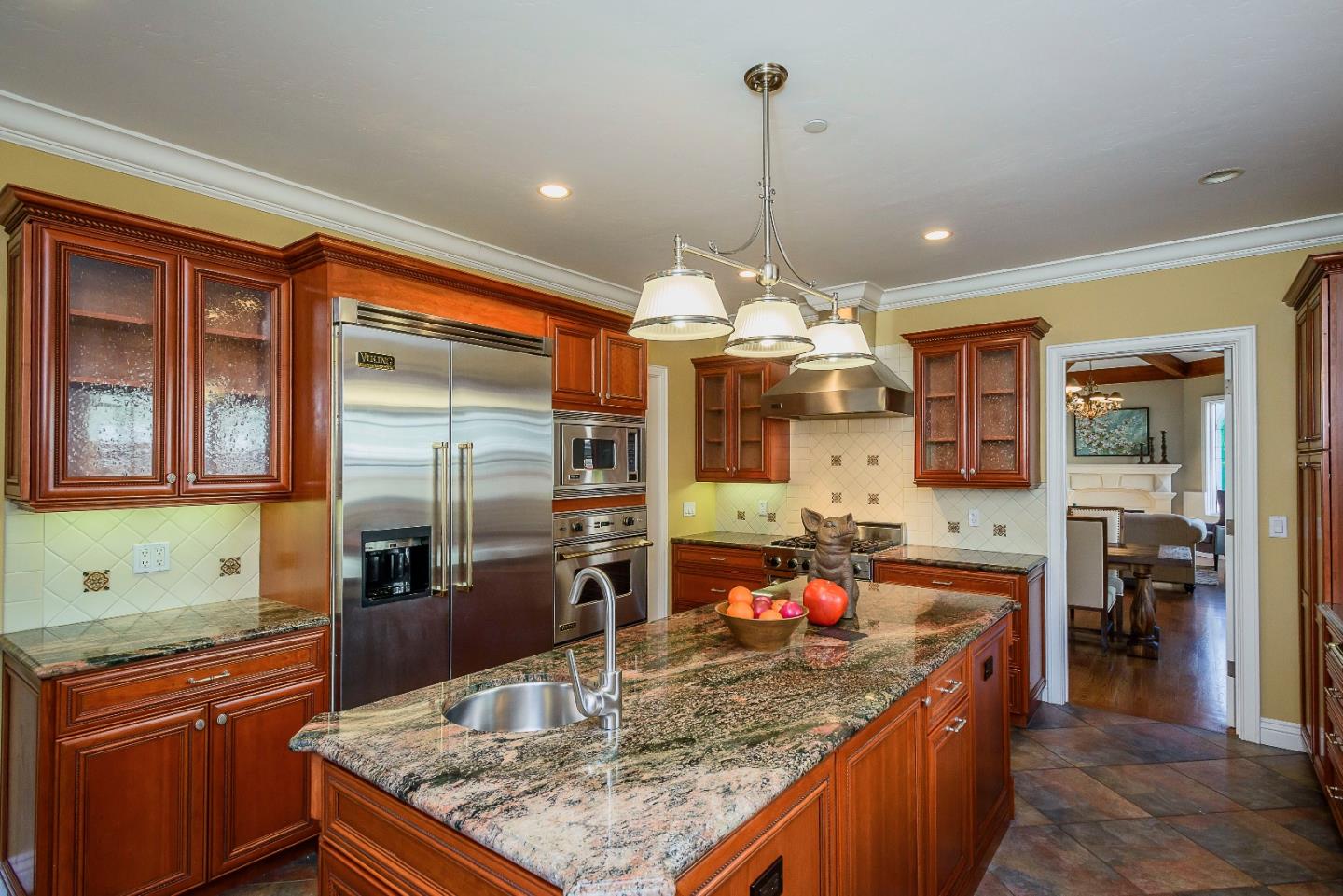 836 Newhall Road Burlingame, CA 94010 - Photo 8 of 38 a kitchen with stainless steel appliances granite countertop a sink stove and refrigerator