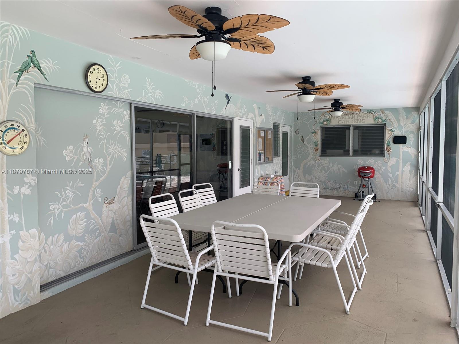 2111 Northeast 42nd Court, Unit 103W Lighthouse Point, FL 33064 - Photo 16 of 22 Covered patio by the pool