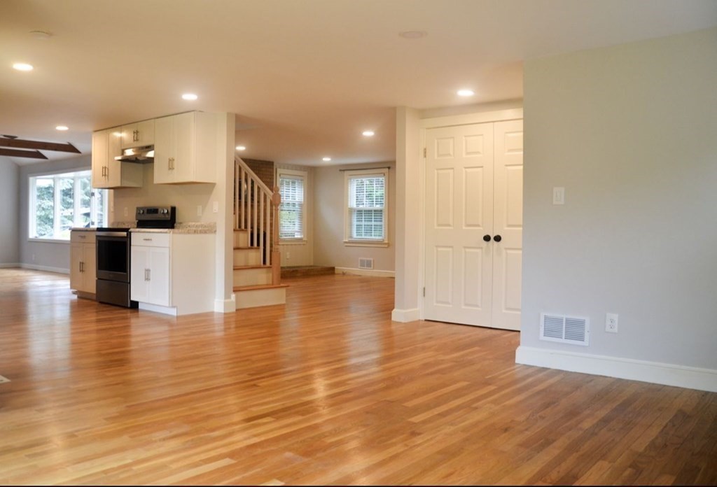 198 Cedar Street Hanover, MA 02339 - Photo 2 of 12 a view of a kitchen with cabinets and wooden floor