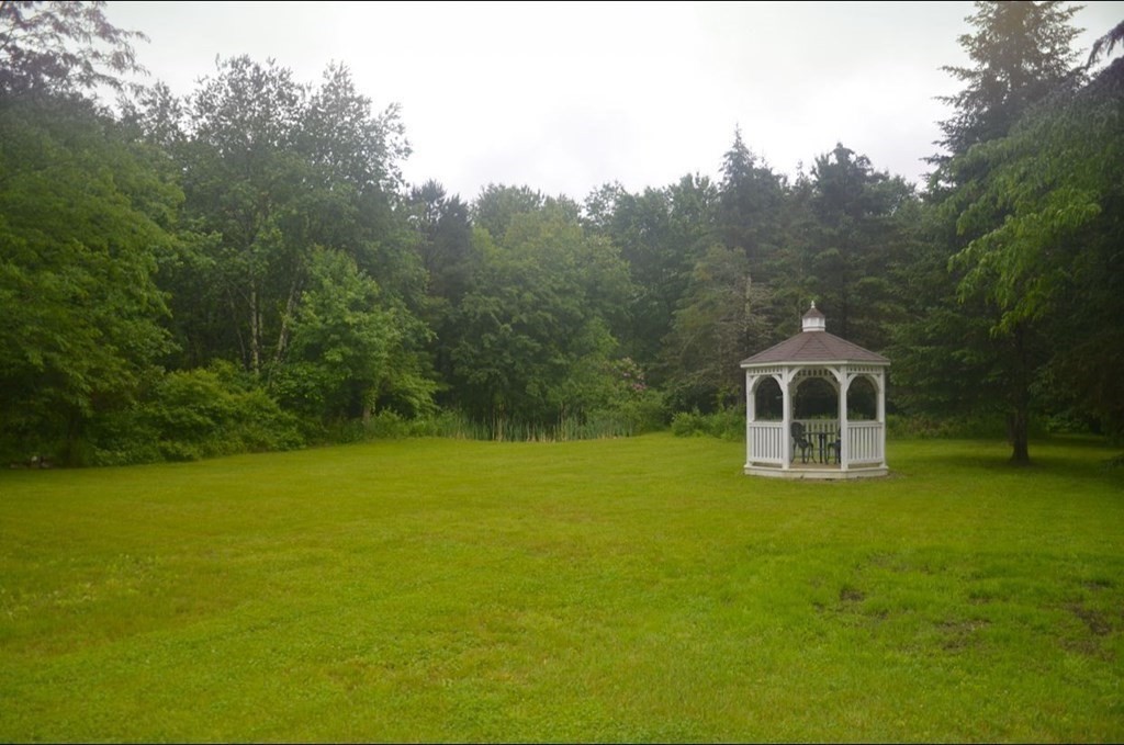 198 Cedar Street Hanover, MA 02339 - Photo 10 of 12 a view of a house with a yard