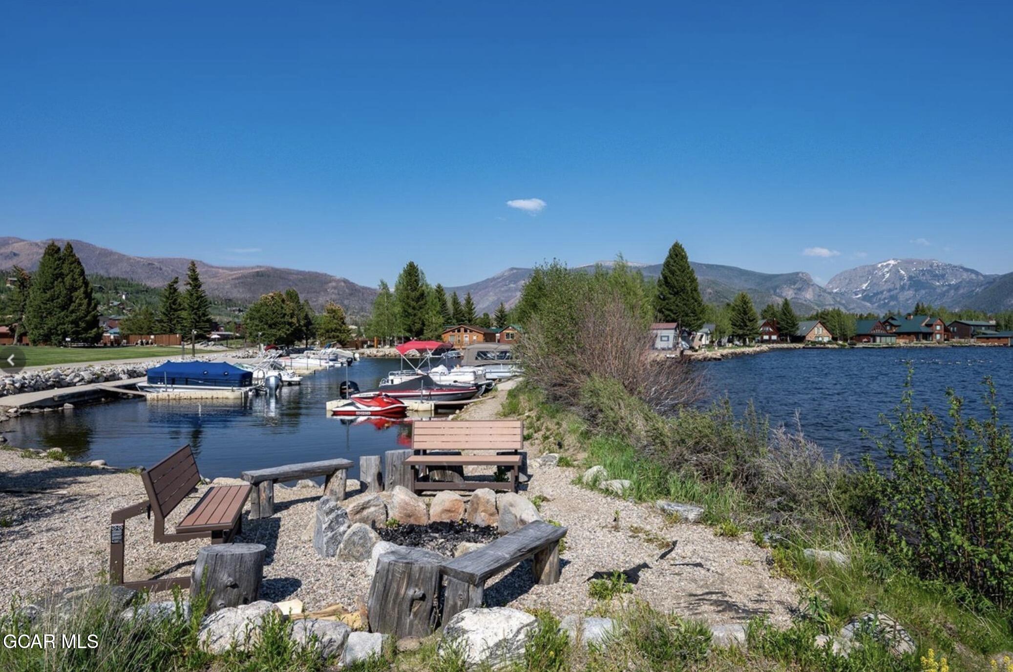 605 Lake Front Road, Unit W8 Grand Lake, CO 80447 - Photo 27 of 28 a view of a lake with couches and city view