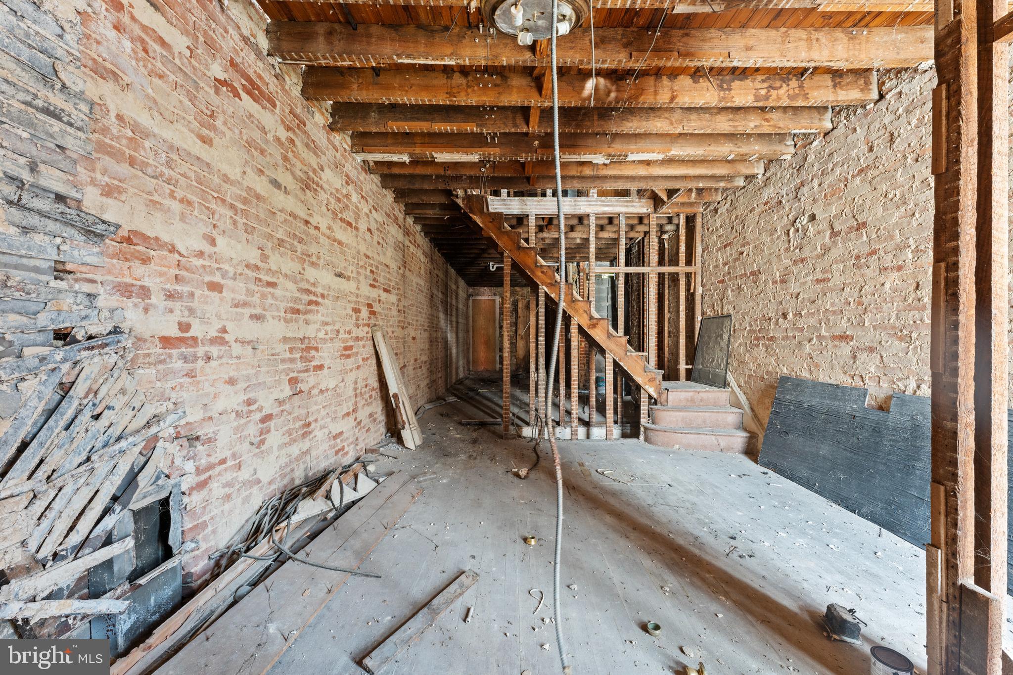 809 Appleton Street Baltimore, MD 21217 - Photo 3 of 16 a view of entryway with wooden floor