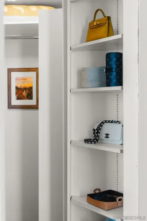 a living room with fireplace furniture and a chandelier