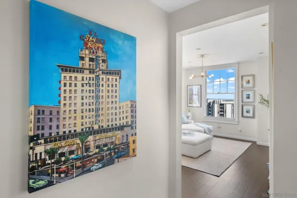 a bedroom with a bed and a chair