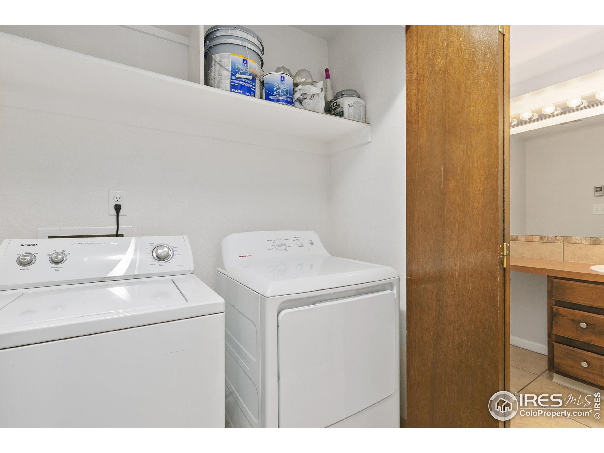 1741 Brookhaven Circle East, Unit D Fort Collins, CO 80525 - Photo 15 of 30 a utility room with dryer and washer
