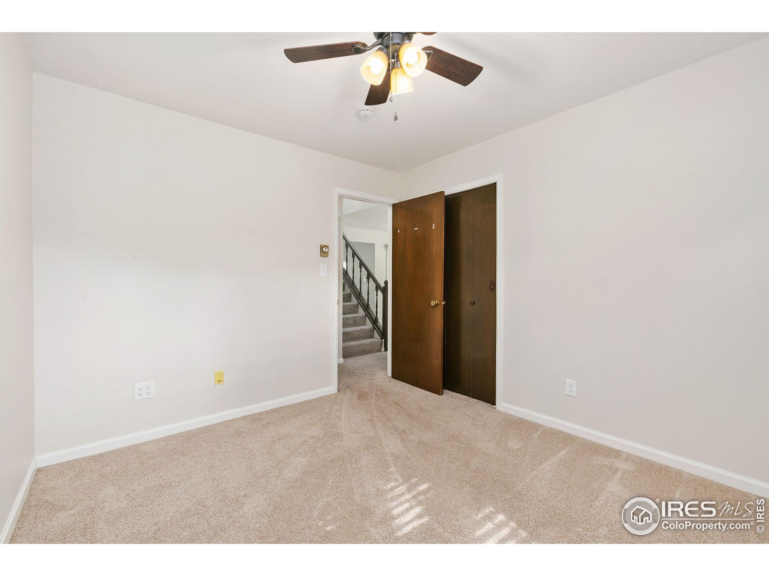 1741 Brookhaven Circle East, Unit D Fort Collins, CO 80525 - Photo 22 of 30 a view of an empty room
