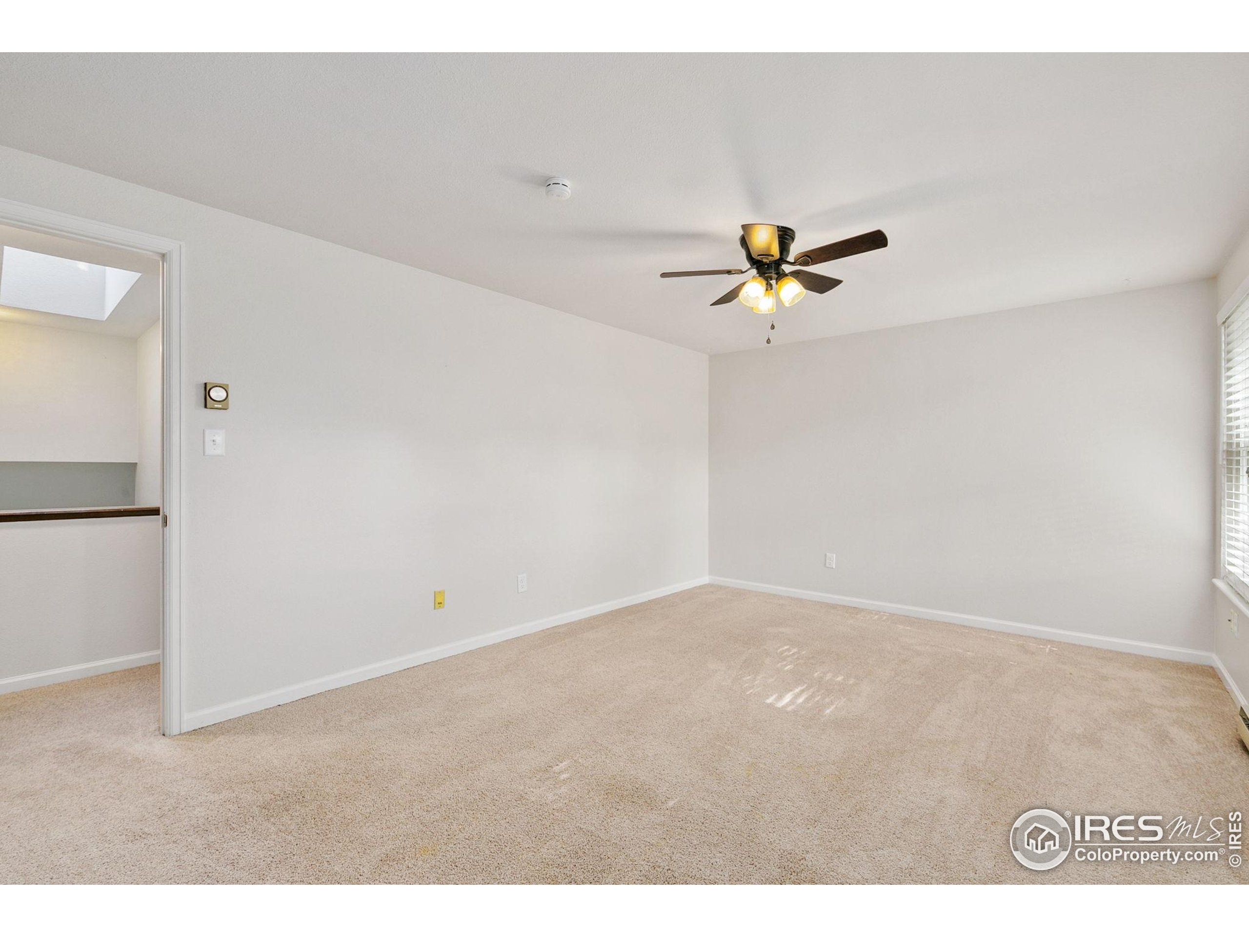 1741 Brookhaven Circle East, Unit D Fort Collins, CO 80525 - Photo 23 of 30 a view of an empty room