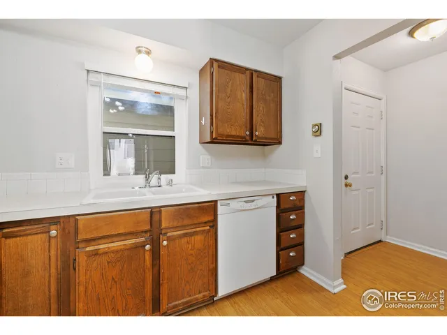 a bathroom with a sink a mirror and a vanity