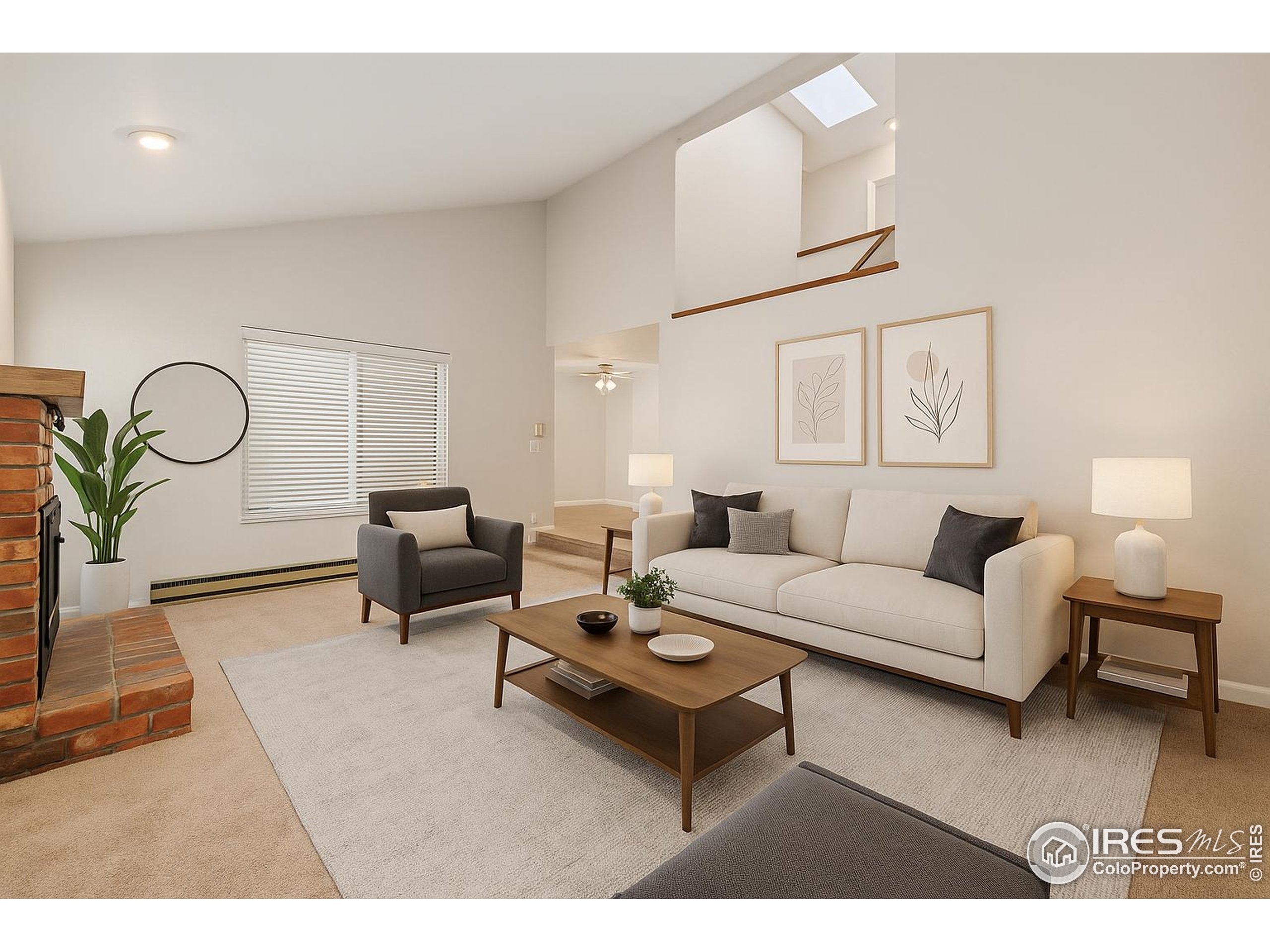 1741 Brookhaven Circle East, Unit D Fort Collins, CO 80525 - Photo 10 of 30 a living room with furniture a rug and a potted plant