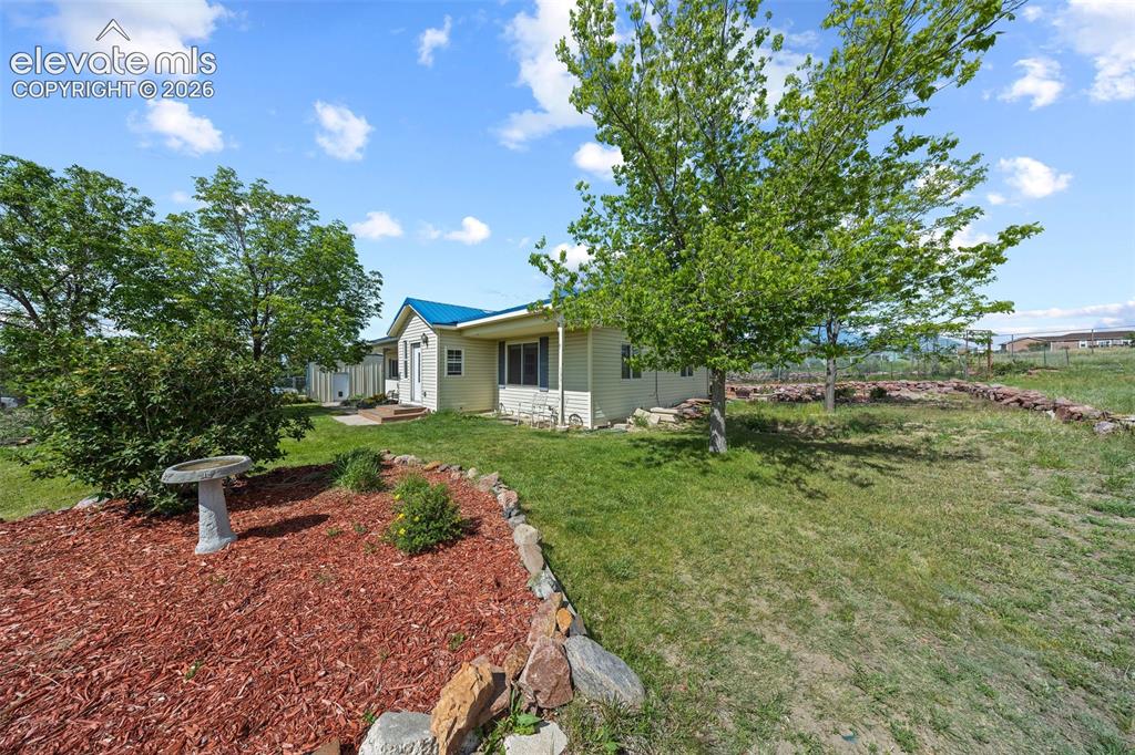 13075 Blaney Road South Peyton, CO 80831 - Photo 34 of 40 Front yard landscaping