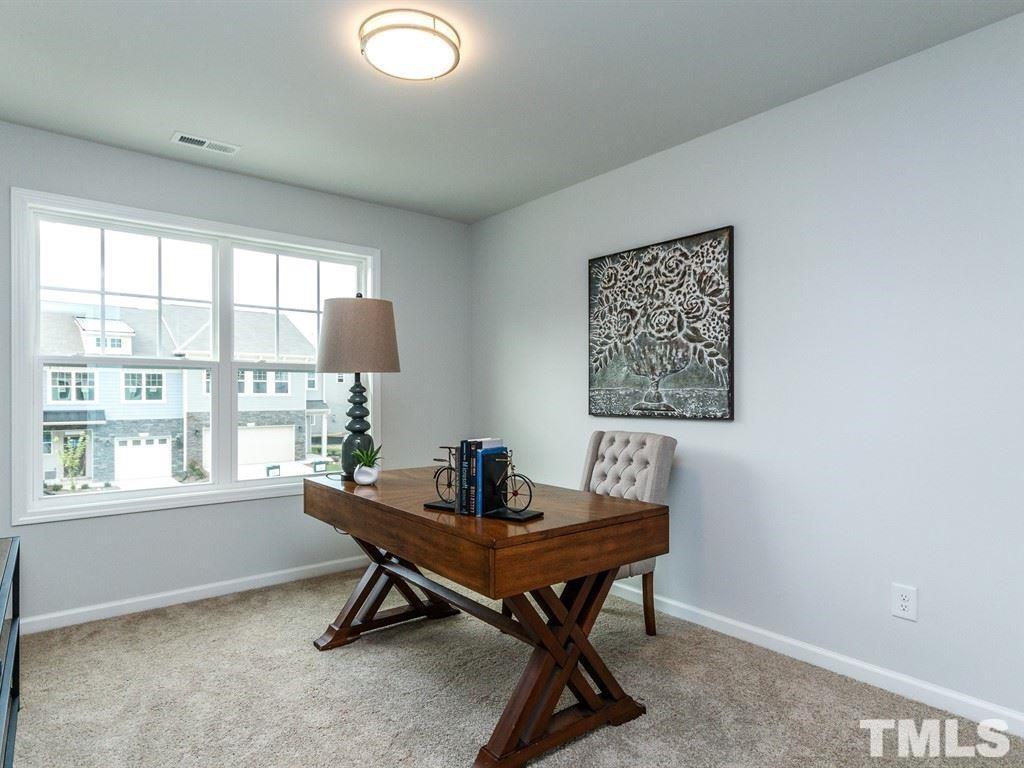 3340 Tracer Drive Graham, NC 27253 - Photo 16 of 23 a view of a workspace with furniture and a window
