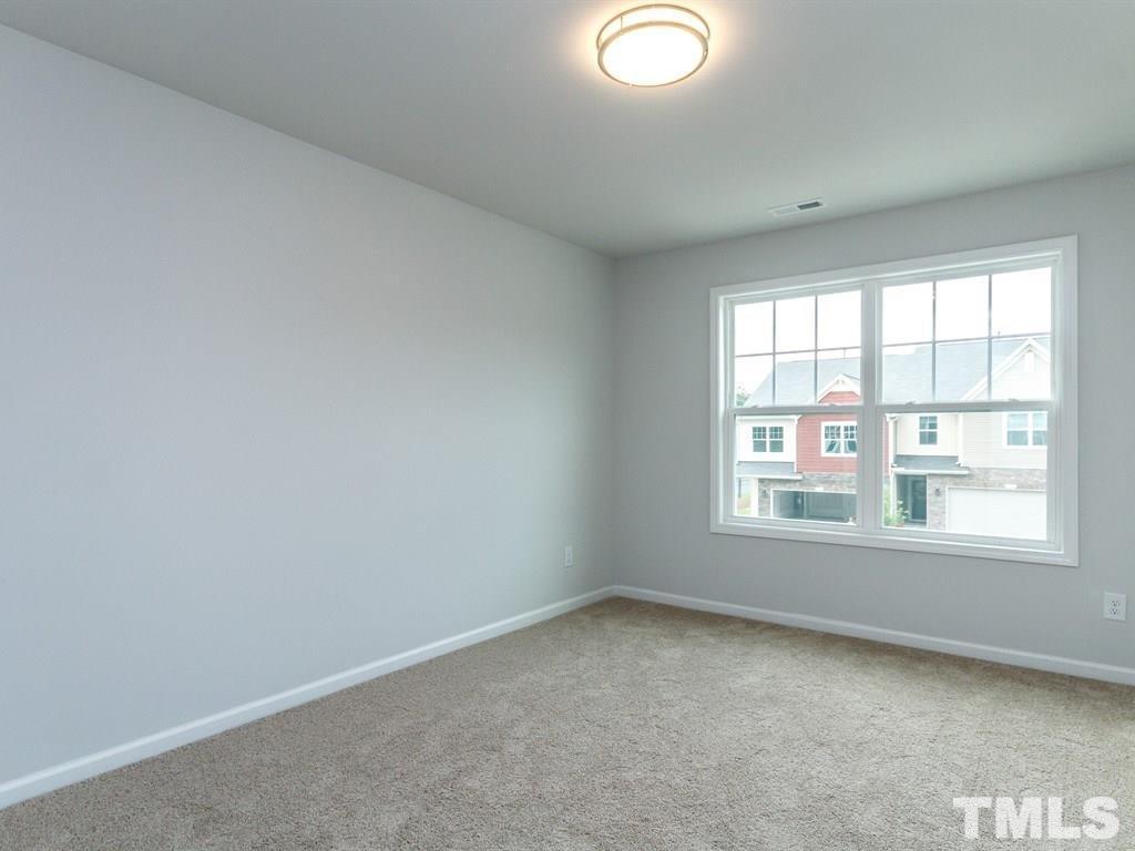 3340 Tracer Drive Graham, NC 27253 - Photo 21 of 23 an empty room with a window