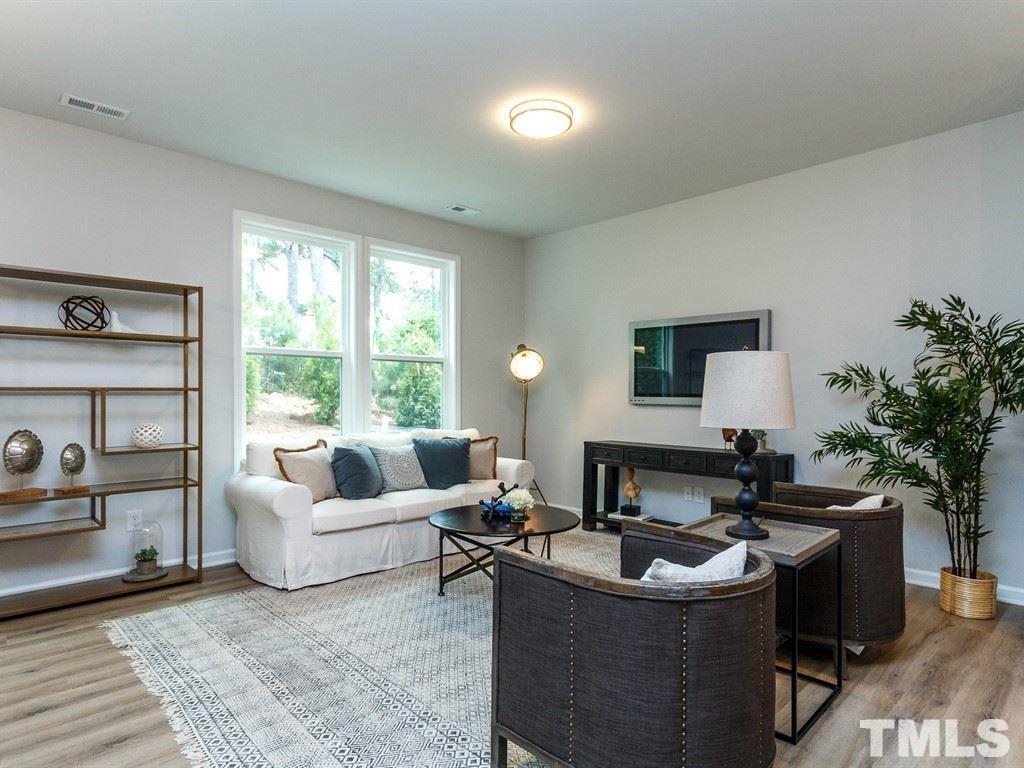 3340 Tracer Drive Graham, NC 27253 - Photo 6 of 23 a living room with furniture and a large window