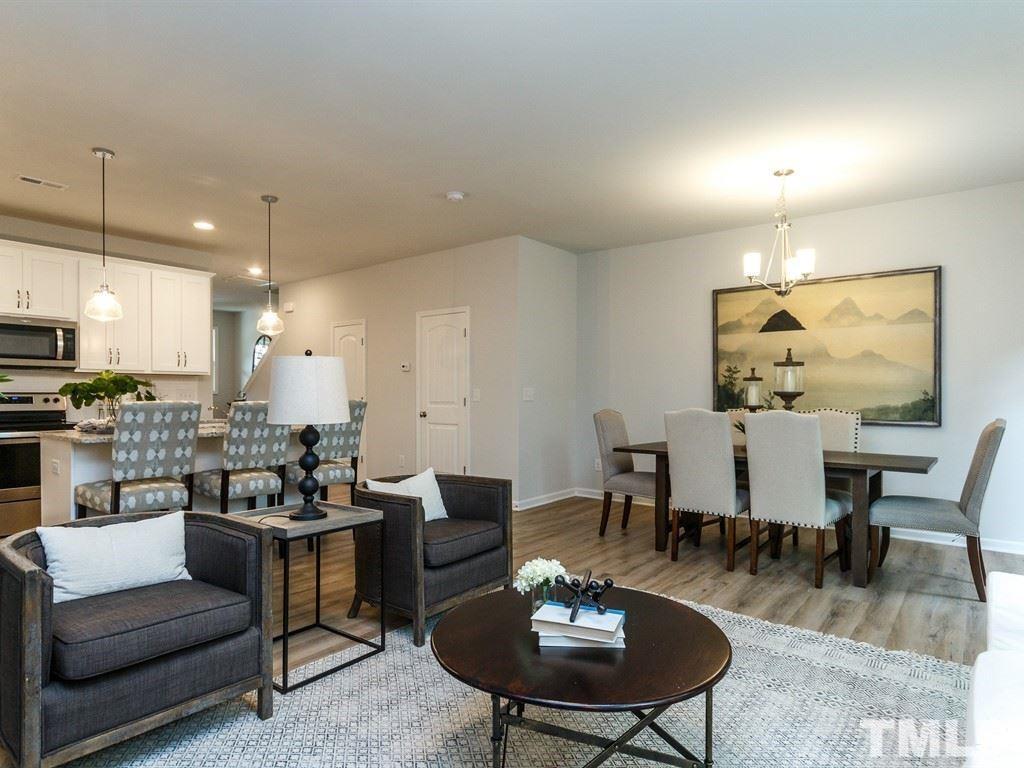 3340 Tracer Drive Graham, NC 27253 - Photo 7 of 23 a view of a dining room with furniture