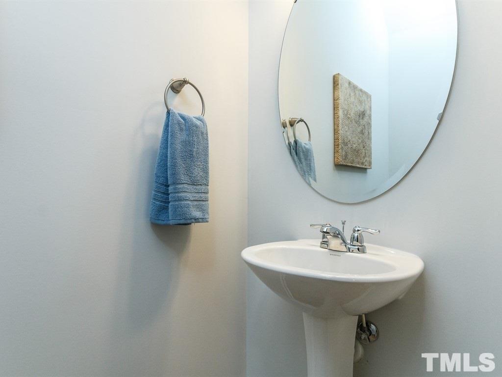 3340 Tracer Drive Graham, NC 27253 - Photo 10 of 23 a bathroom with a sink and mirror