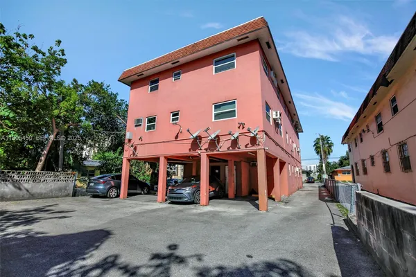 an aerial view of a house with garden