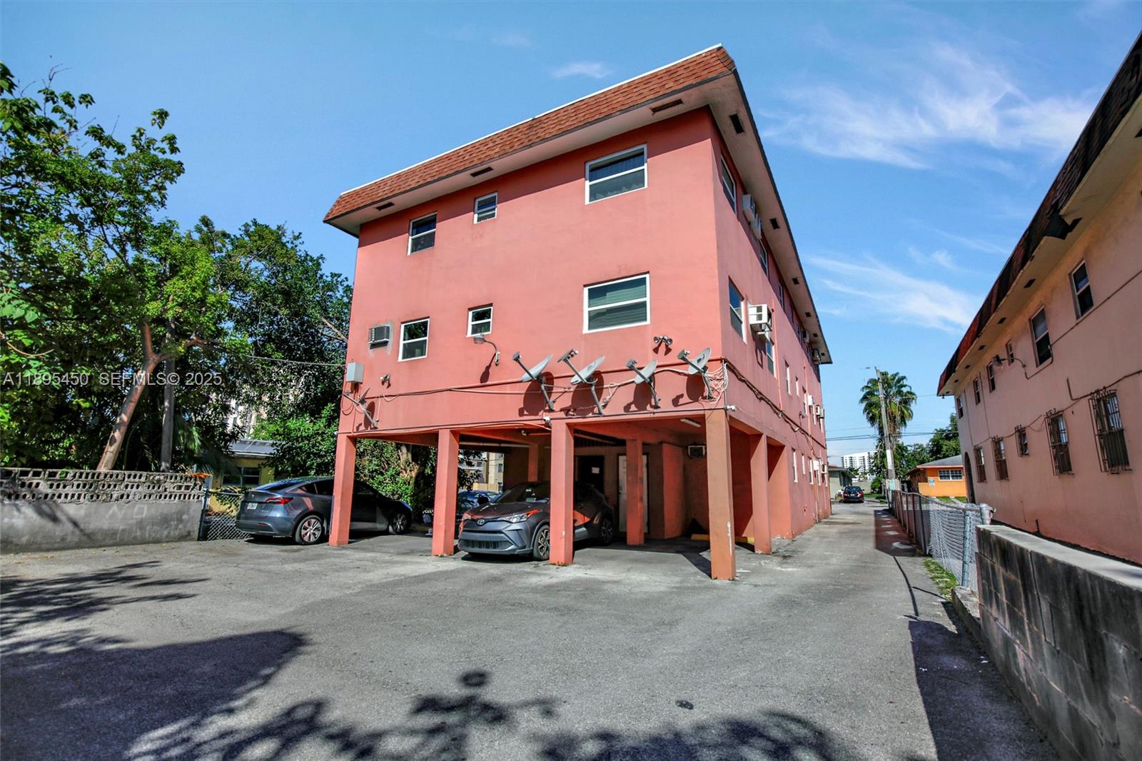458 Southwest 9th Street, Unit 8 Miami, FL 33130 - Photo 18 of 22 a front view of a building with street