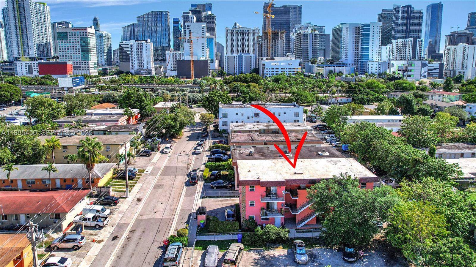 458 Southwest 9th Street, Unit 8 Miami, FL 33130 - Photo 20 of 22 a view of a city with tall buildings