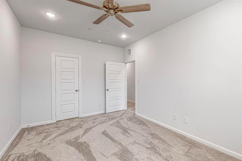 265 Buck Ridge Drive Frisco, TX 75068 - Photo 28 of 40 a view of empty room with a ceiling fan