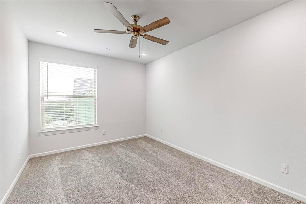 265 Buck Ridge Drive Frisco, TX 75068 - Photo 29 of 40 an empty room with a window