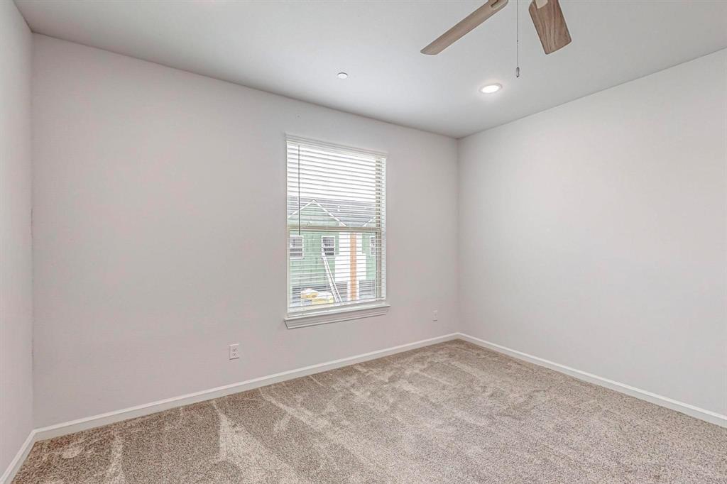 265 Buck Ridge Drive Frisco, TX 75068 - Photo 35 of 40 an empty room with windows